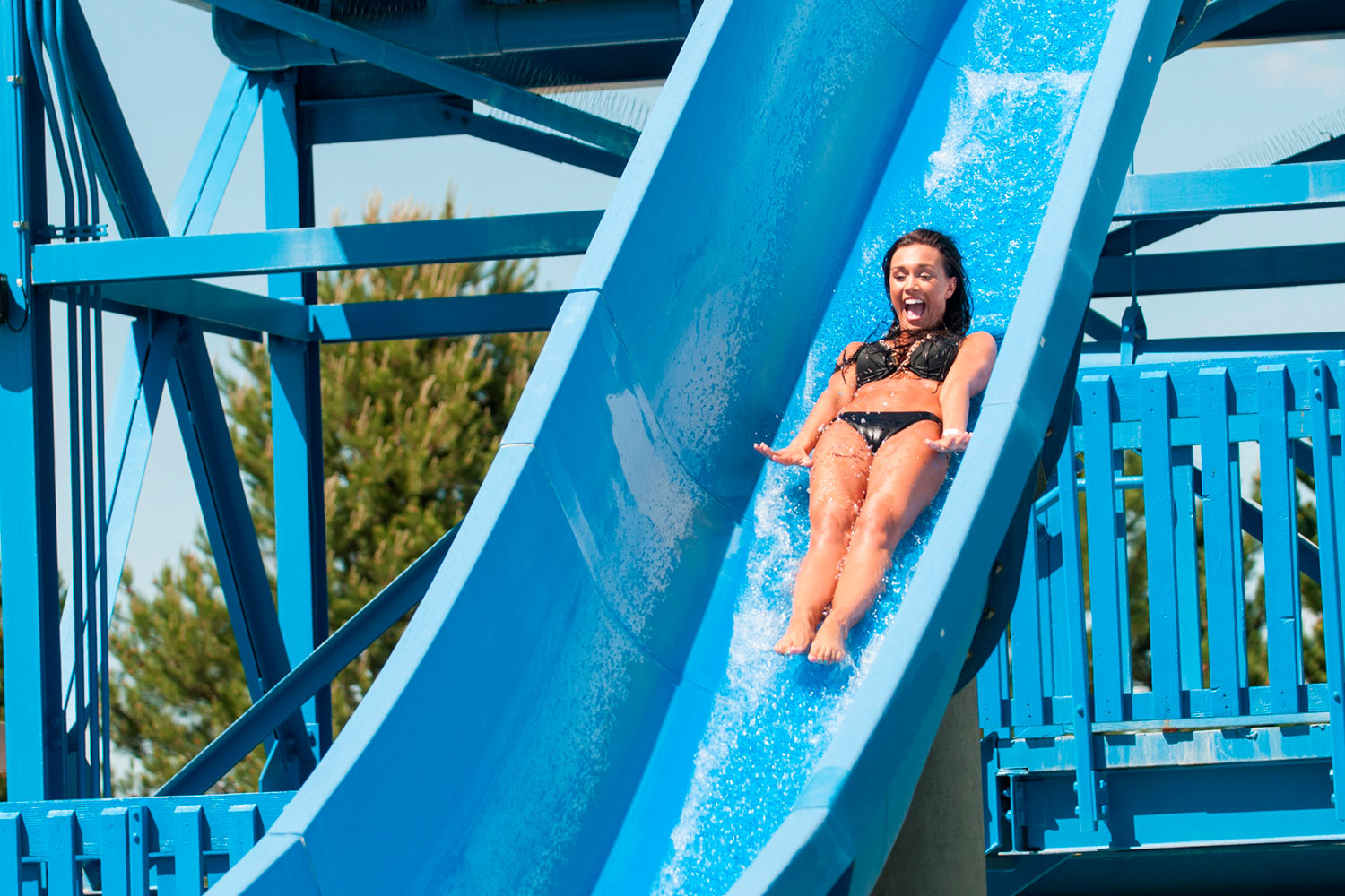 Girl Riding Drop Slide