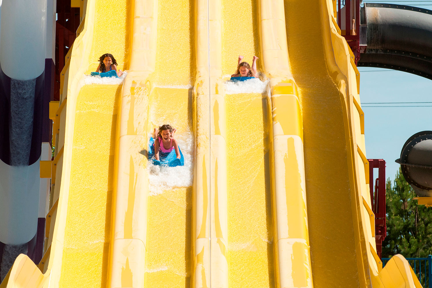 Three Girls Race Down Racing Ridge